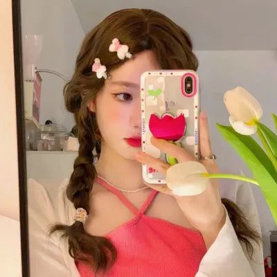 彼女